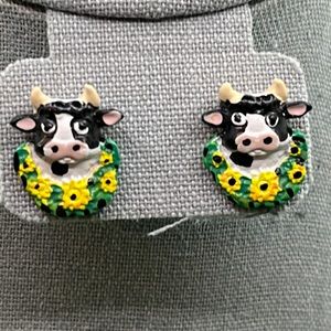 Plastic cow and wreath earrings